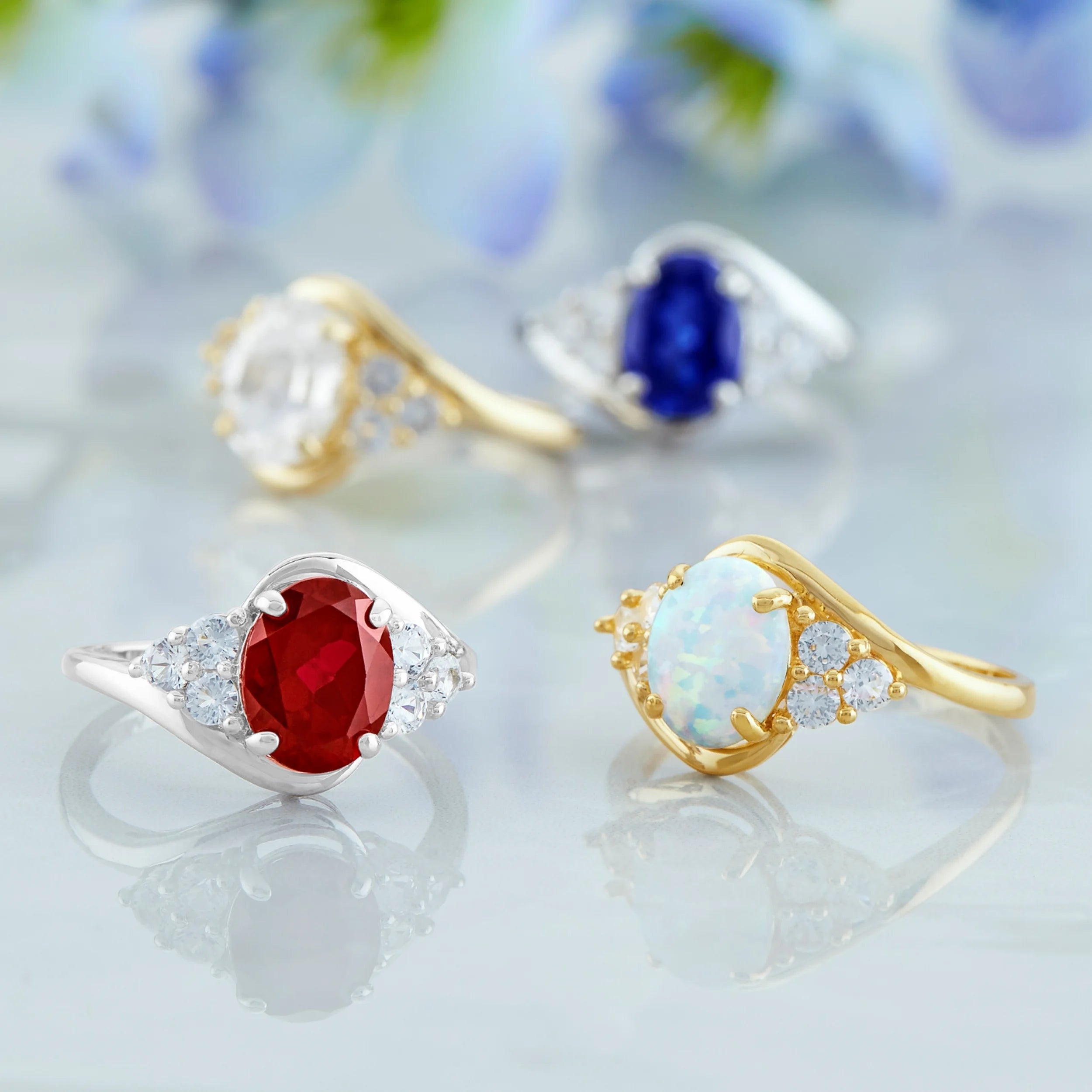Red Ruby Oval Halo Ring in 10k Yellow Gold with Created White Sapphire U420544